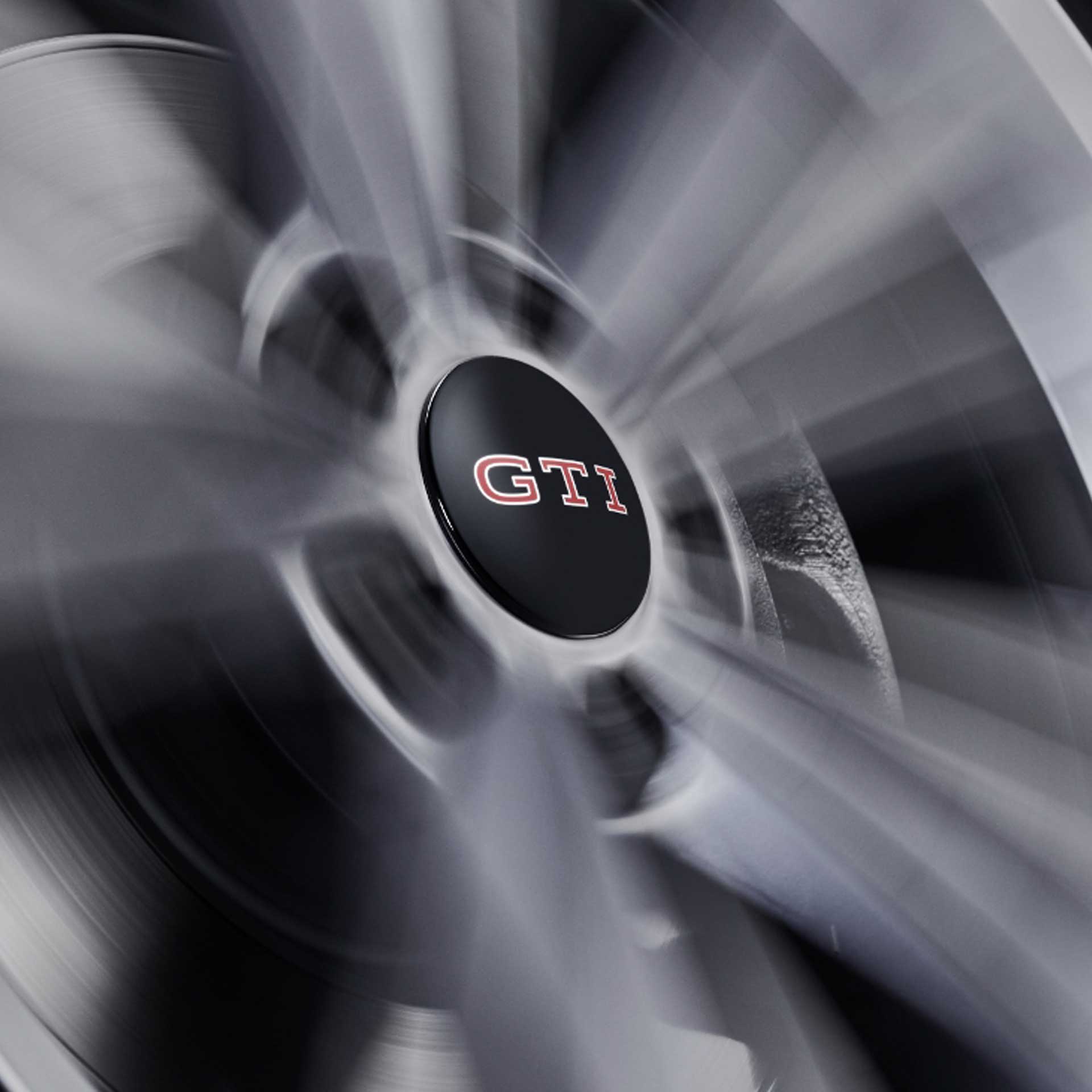 Volkswagen feststehende Radnabendeckel dynamische Spinnerfunktion GTI-Logo