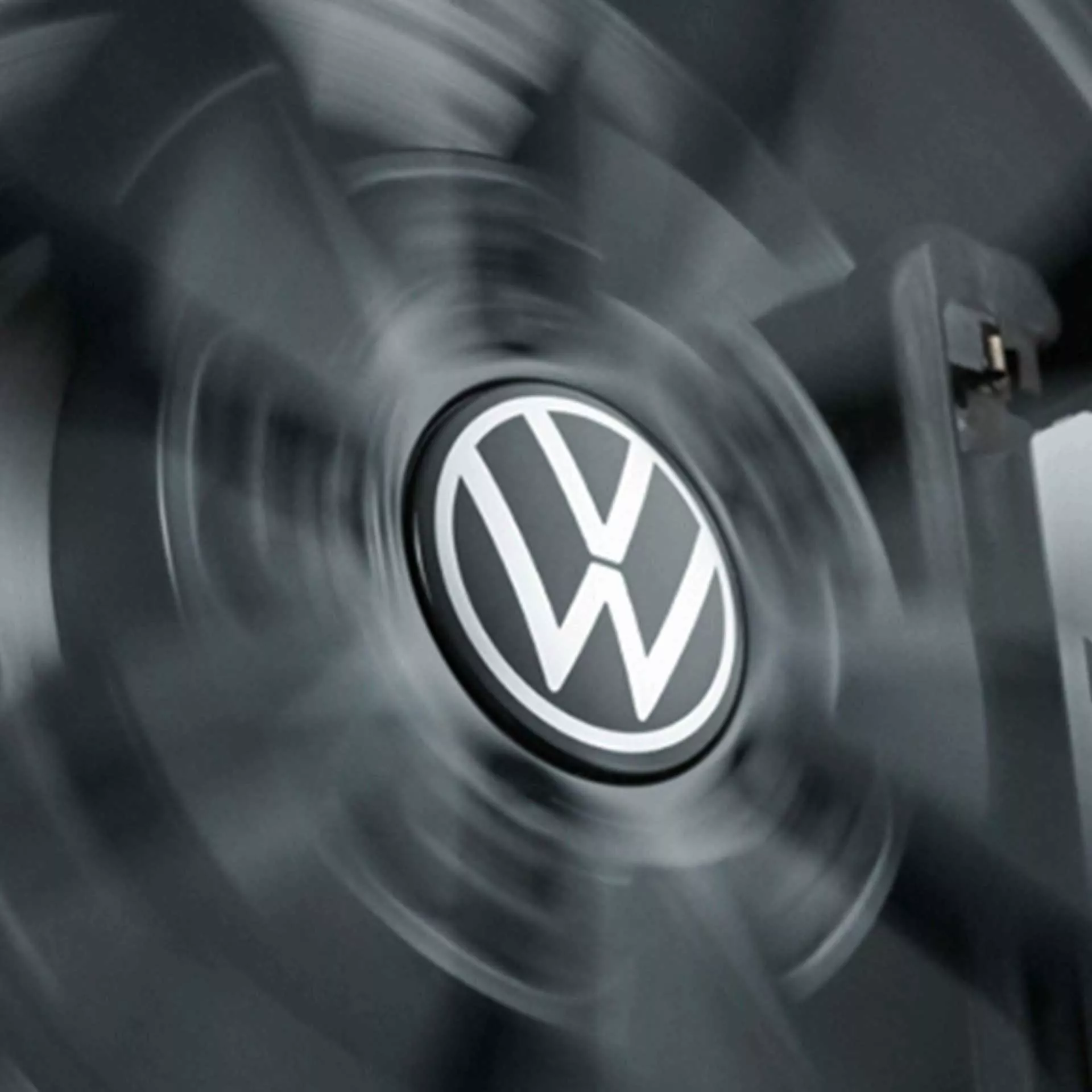 Volkswagen feststehende Radnabendeckel dynamische Spinnerfunktion New Volkswagen Logo 000071213D